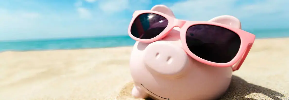 Piggy Bank on Beach 1727x600